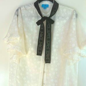 Cece Top with Flutter Sleeves and Tie Neck Detail